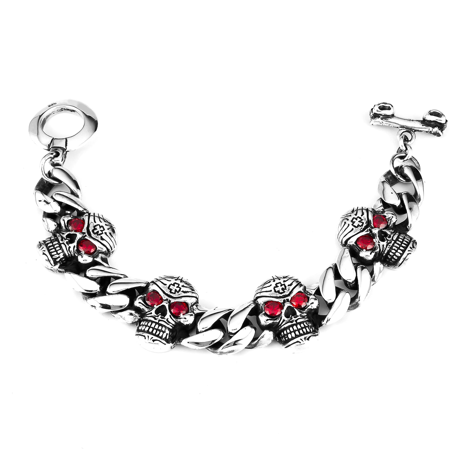 Handcrafted 925 sterling silver bracelet. This bracelet consists of chains, 4 engraved skulls with natural red garnet eyes and the chain is unhooked. 